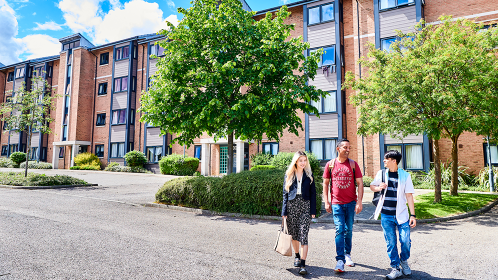 A close up photo of the exterior of Bowsden Court, taken on a sunny day with blue skies.